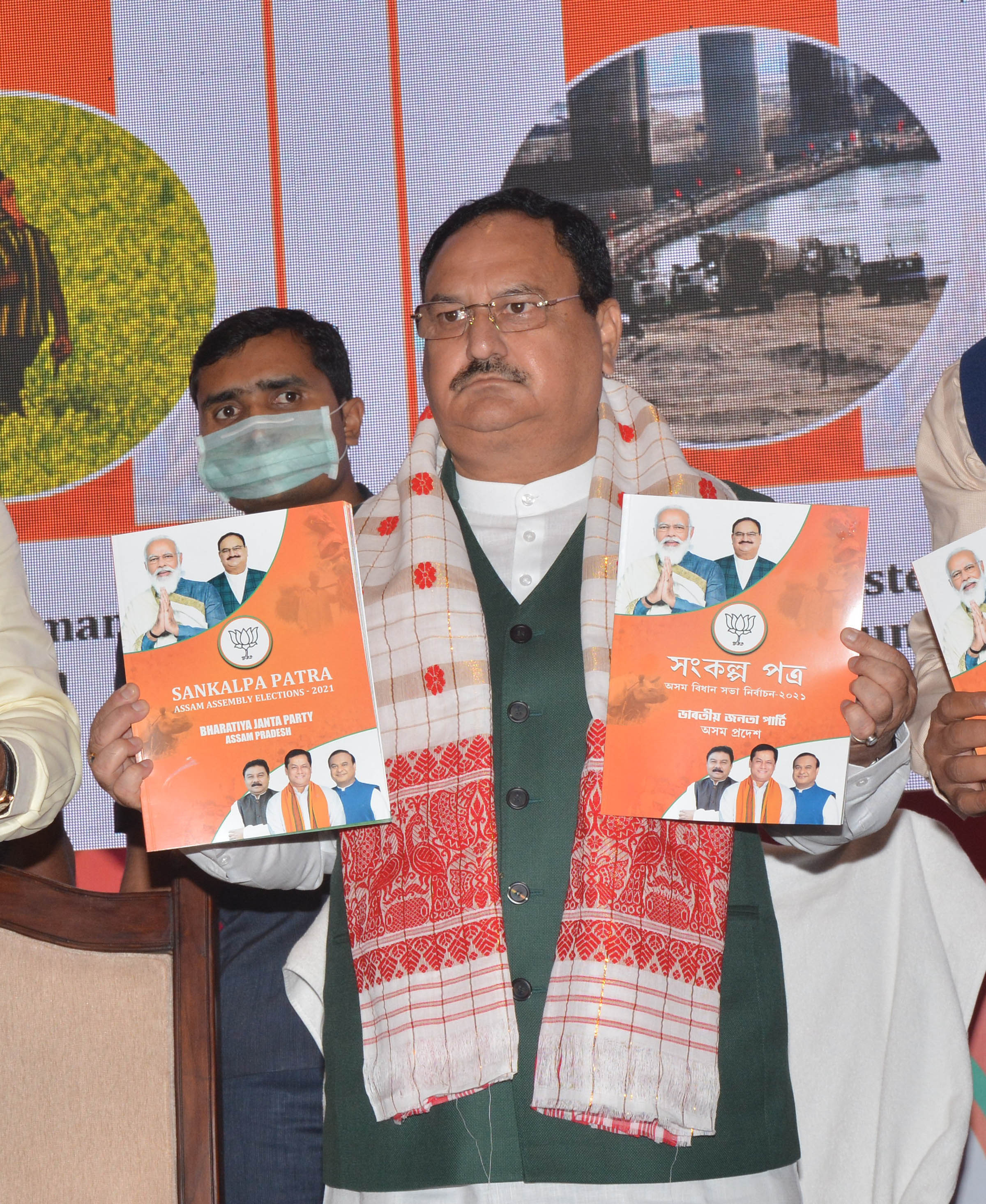 bjp-releases-manifesto-mum-on-core-issue-assam-times